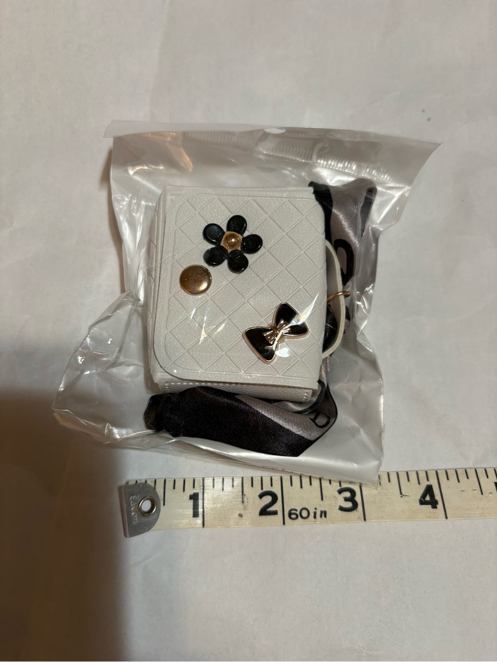 White Quilted Mini Bag charm / keychain Crossbody Bag with Black Flower Accent